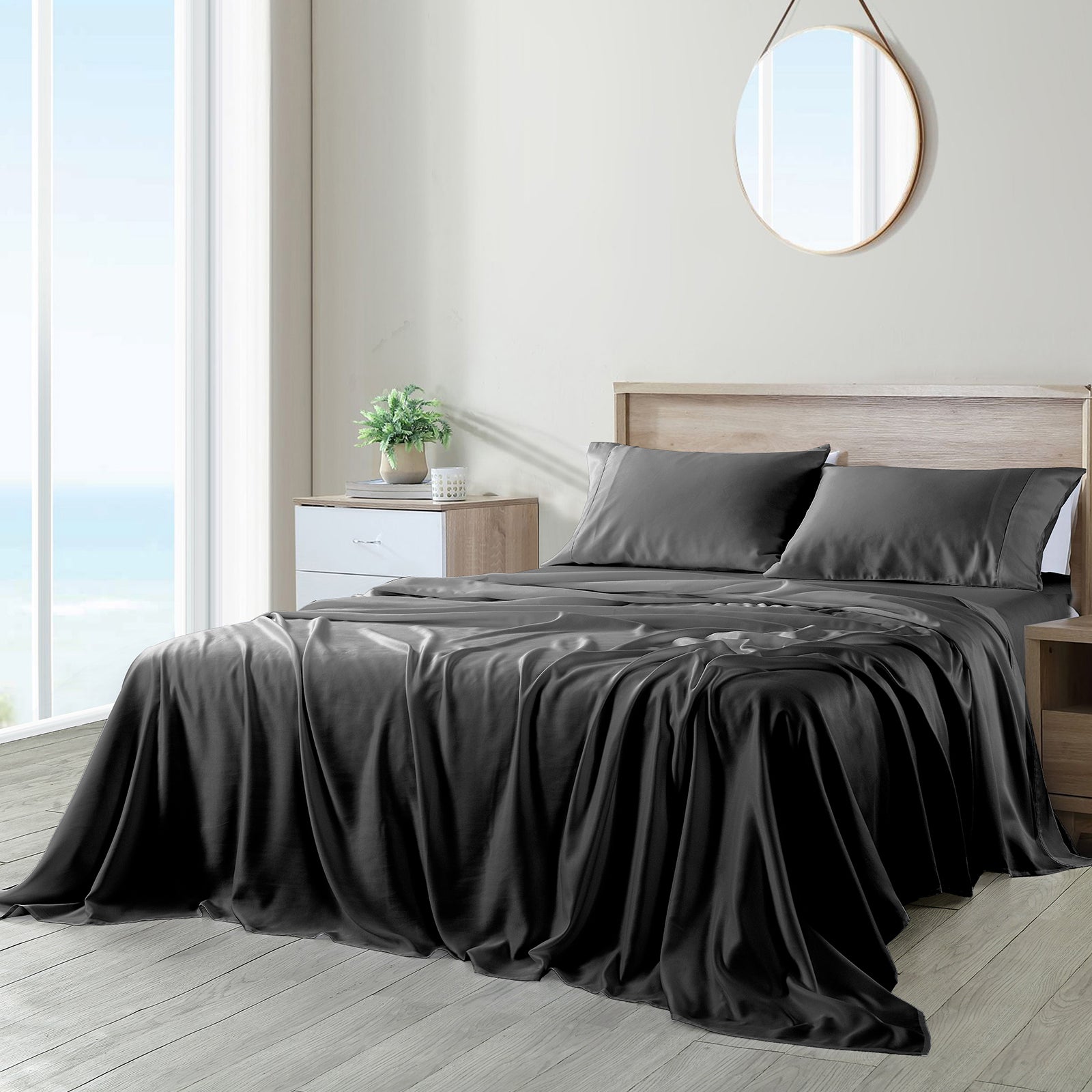 Royal Comfort 600 Thread Count Cooling Ultra Soft Tencel Eucalyptus sheets set featuring a flat sheet, fitted sheet, and two pillowcases in a luxurious design.